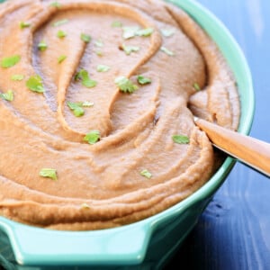 Instant Pot Refried Beans with garnish.