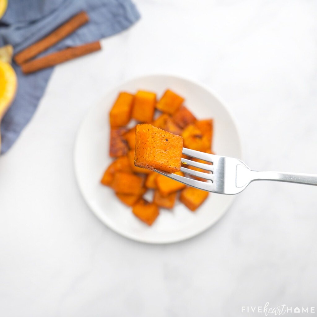 Oven roasted butternut squash on fork.