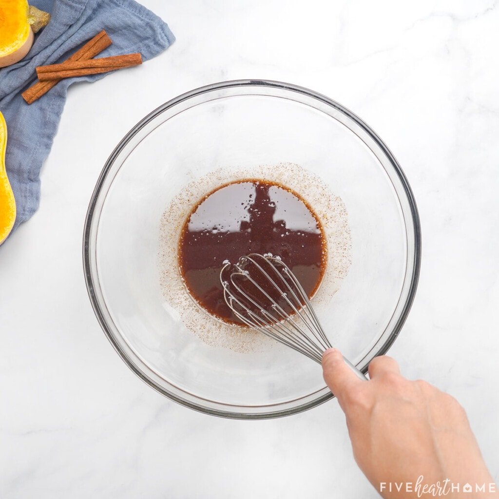 Whisking glaze for butternut squash roasted recipe.