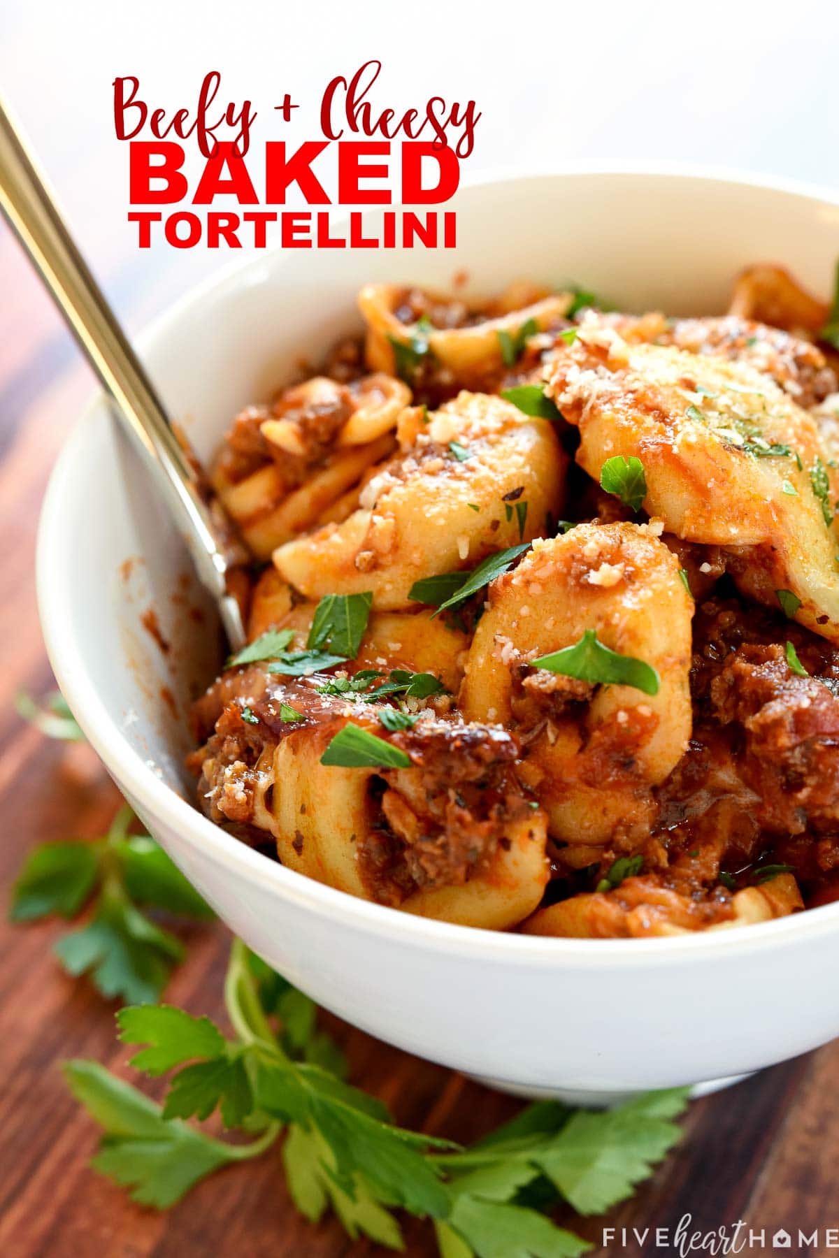 Beefy and cheesy Baked Tortellini with text overlay.