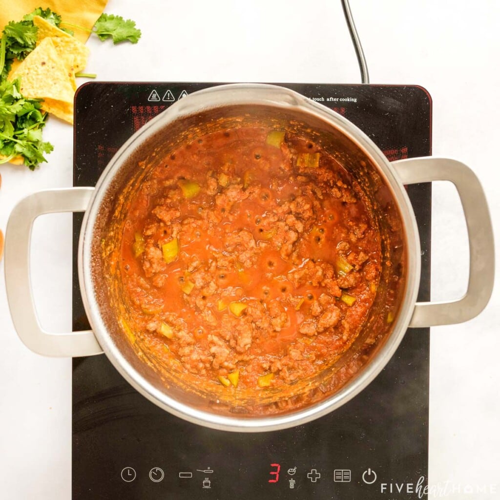 Enchilada Dip bubbling on stove.