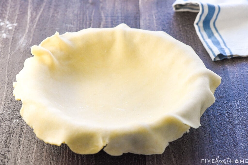 Best pie crust recipe laid into pie plate.