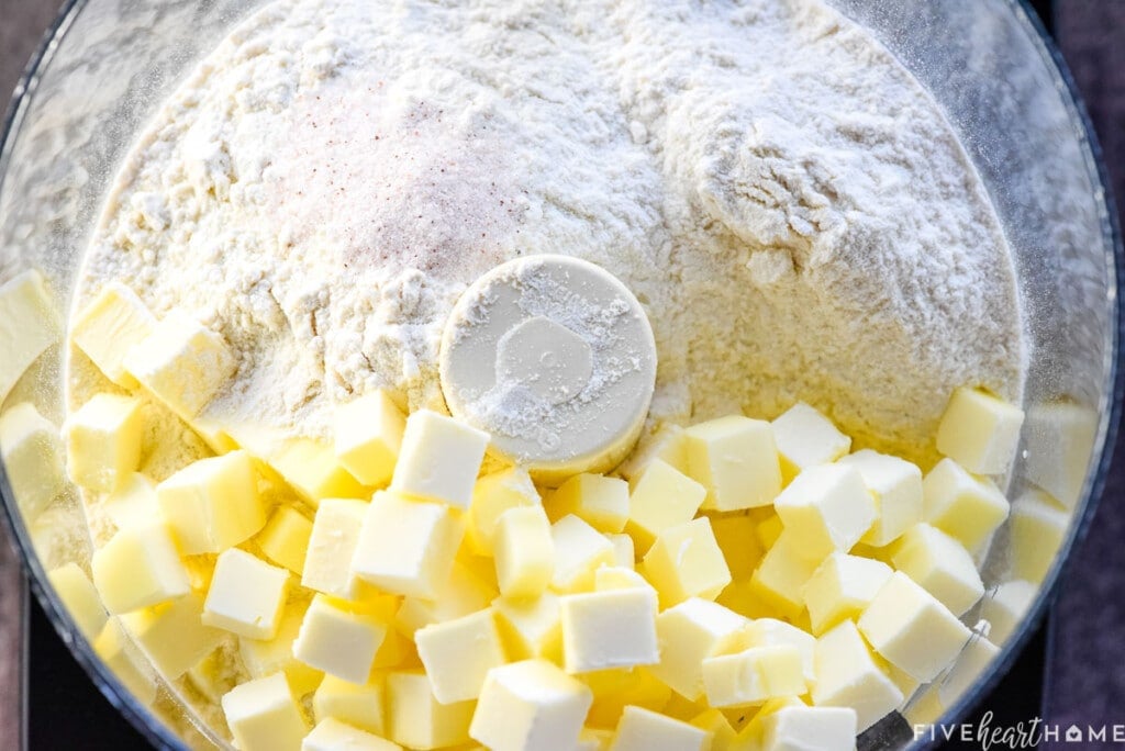 Butter and flour in food processor to make flaky pie crust recipe.