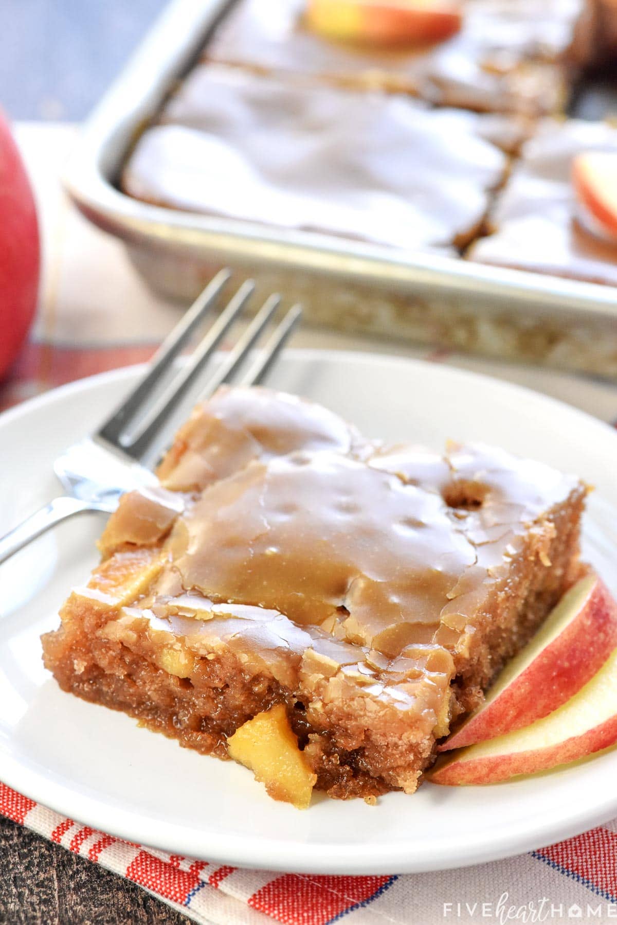 Slice of Caramel Apple Cake on plate.