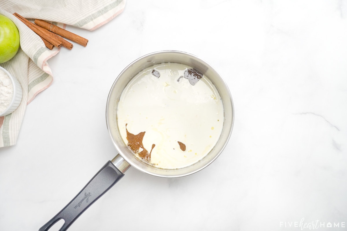 Mixing glaze for Caramel Apple Cake.