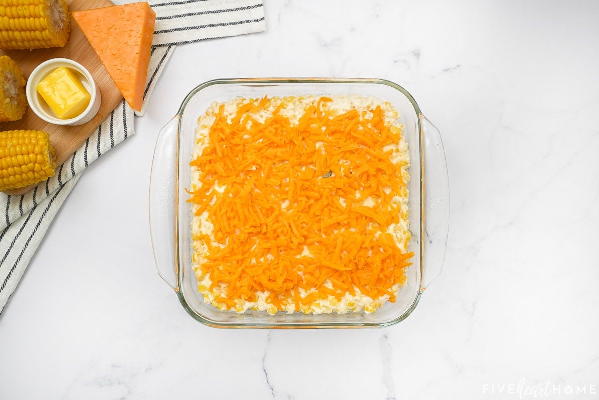 Cheesy corn casserole in baking dish.