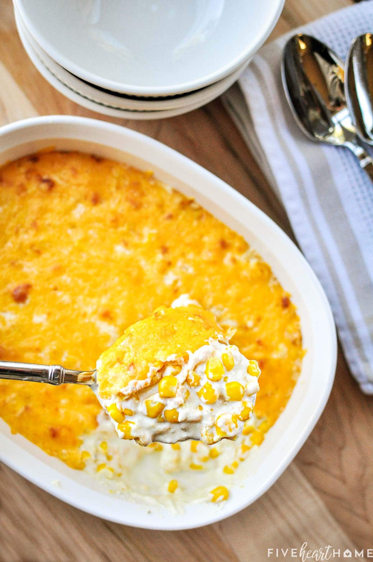 Aerial view of corn casserole with cream cheese.