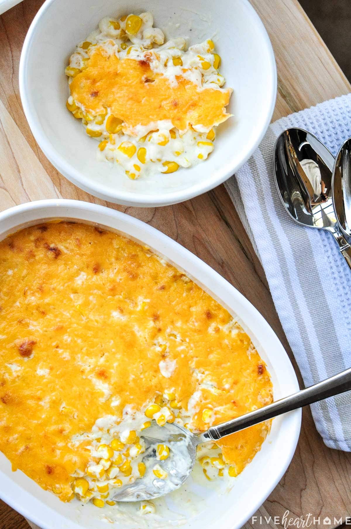Corn Casserole with cream cheese in bowl and in baking dish with spoon.