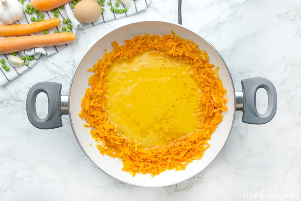 Adding egg to make Easy Fried Rice.