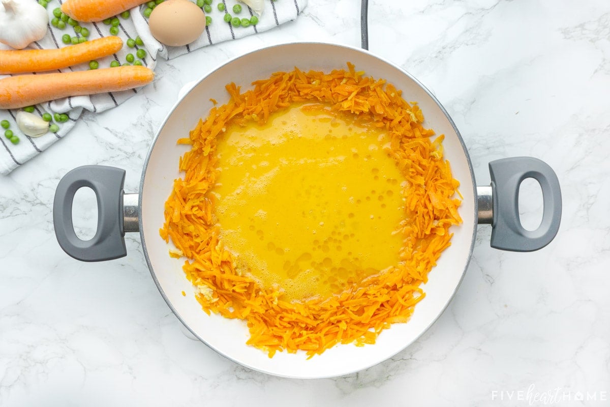 Adding egg to make Easy Fried Rice.