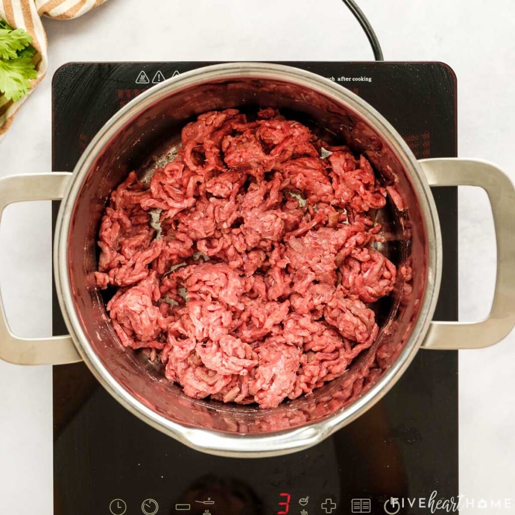 Ground beef in a pot.