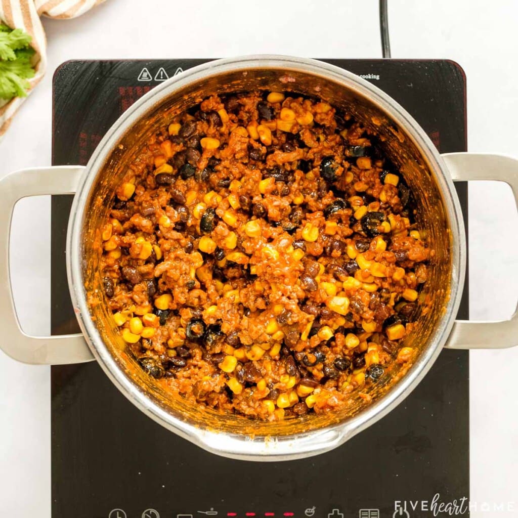 Taco Cornbread Casserole filling mixed together in pot.