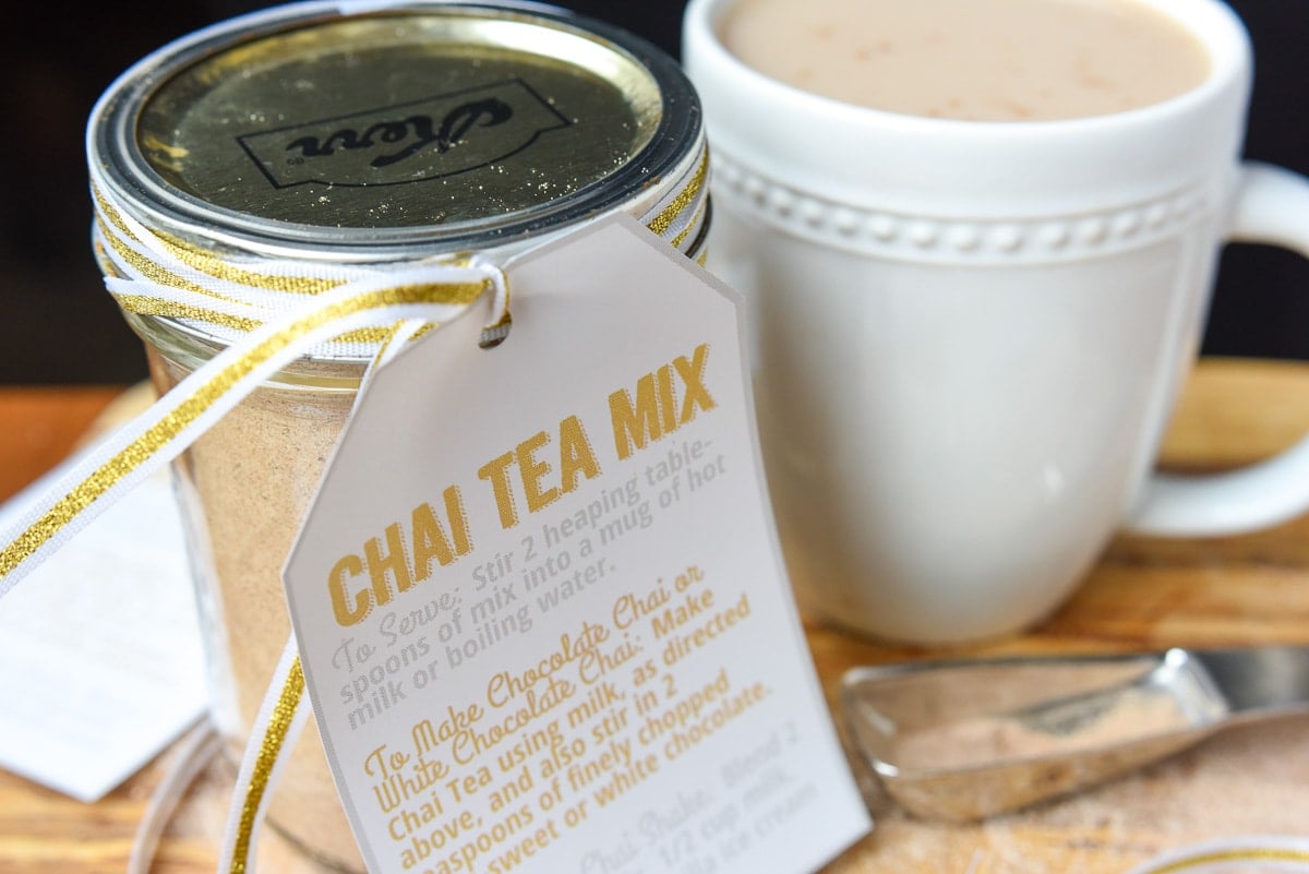 Homemade chai tea in a mug and chai tea mix in a jar.