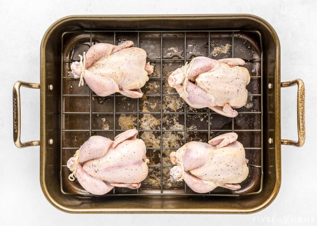 Cornish hens in baking pan.