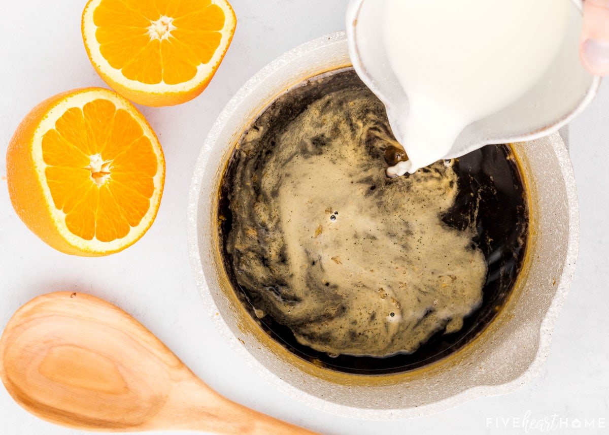 Adding cornstarch slurry to thicken glaze.