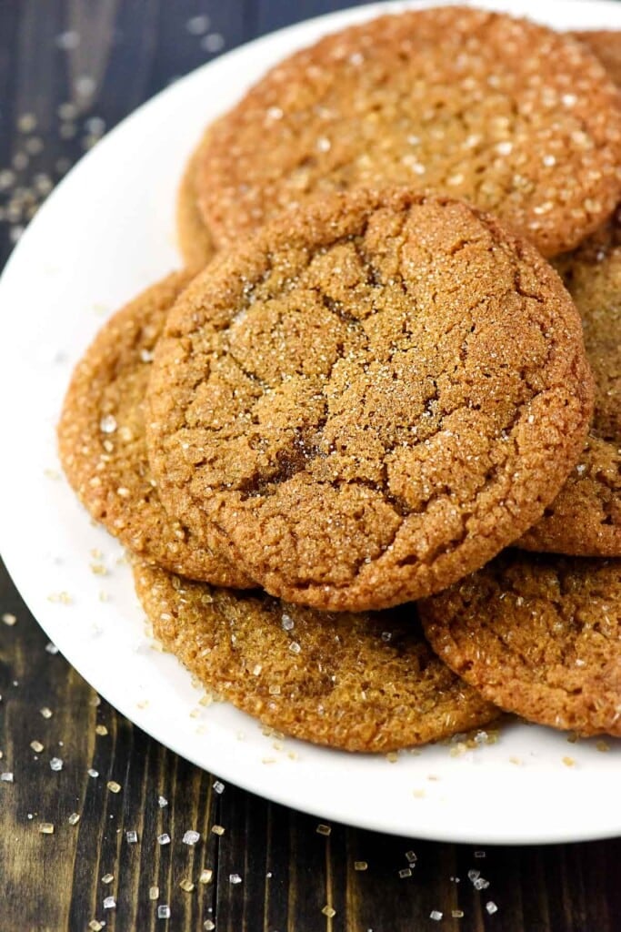 Big soft Ginger Cookies piled on plate.