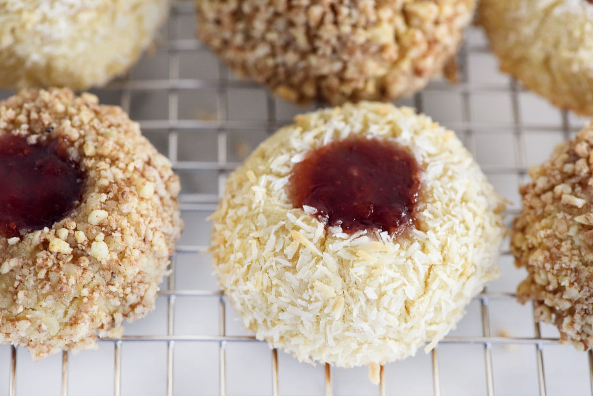 Close-up of thumbprint cookies with jam.