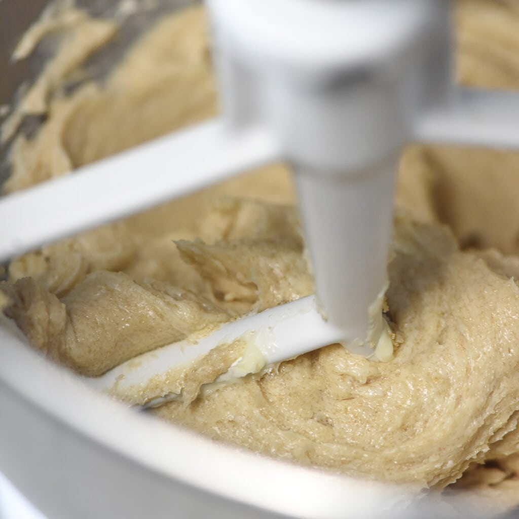 Butter creamed with brown sugar to make thumbprint cookies.