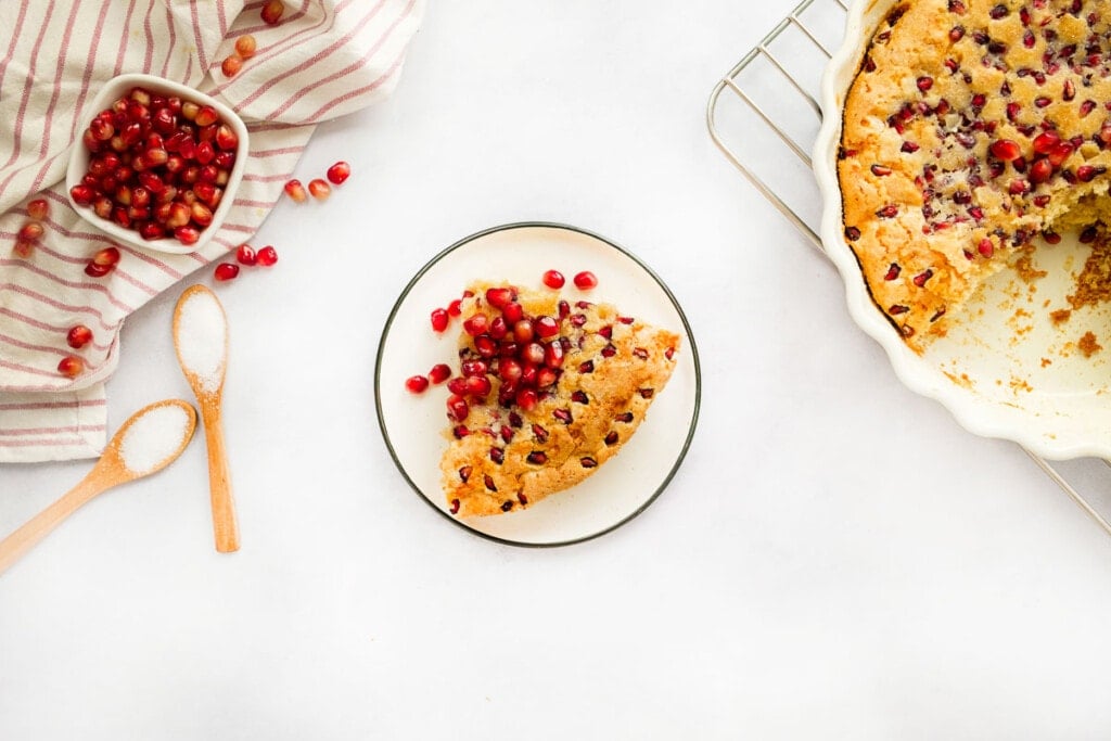 Easy Pomegranate Cake slice on plate.