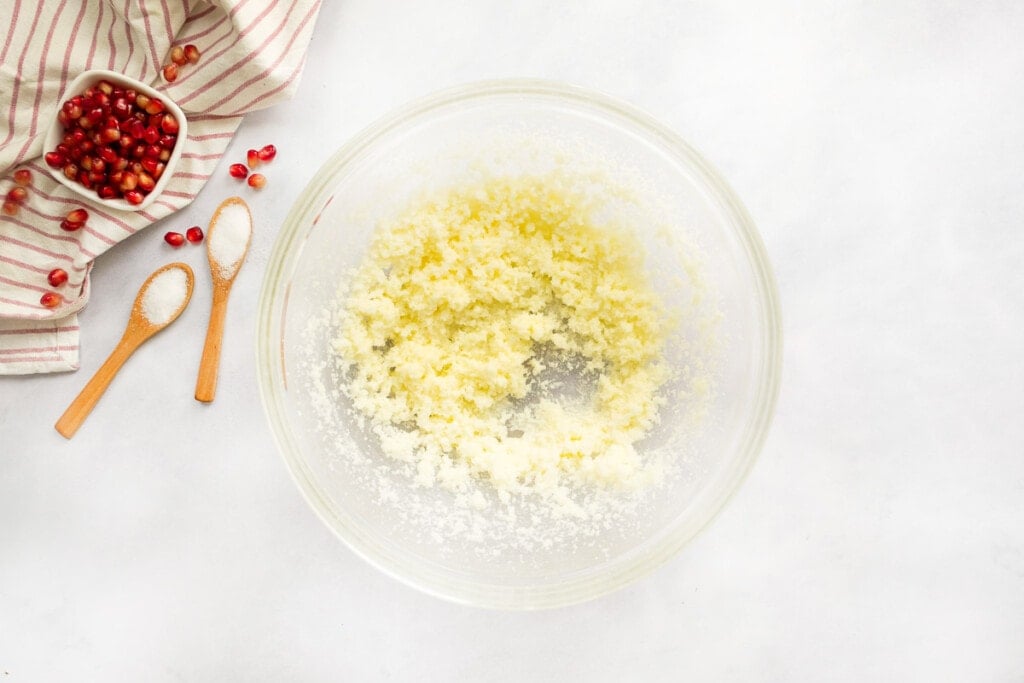 Butter and sugar beaten together for Pomegranate Cake recipe.