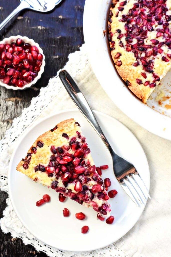 Aerial view of Pomegranate Cake in dish and on plate.