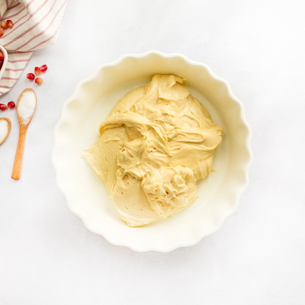 Transferring batter to pie plate.