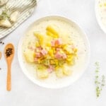 Aerial view of Potato Corn Chowder in white bowl.