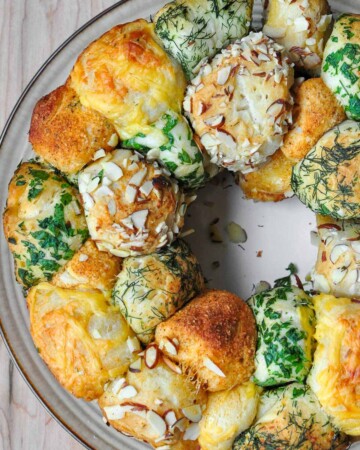 Savory Monkey Bread aerial view of monkey bread coated with herbs and cheese.