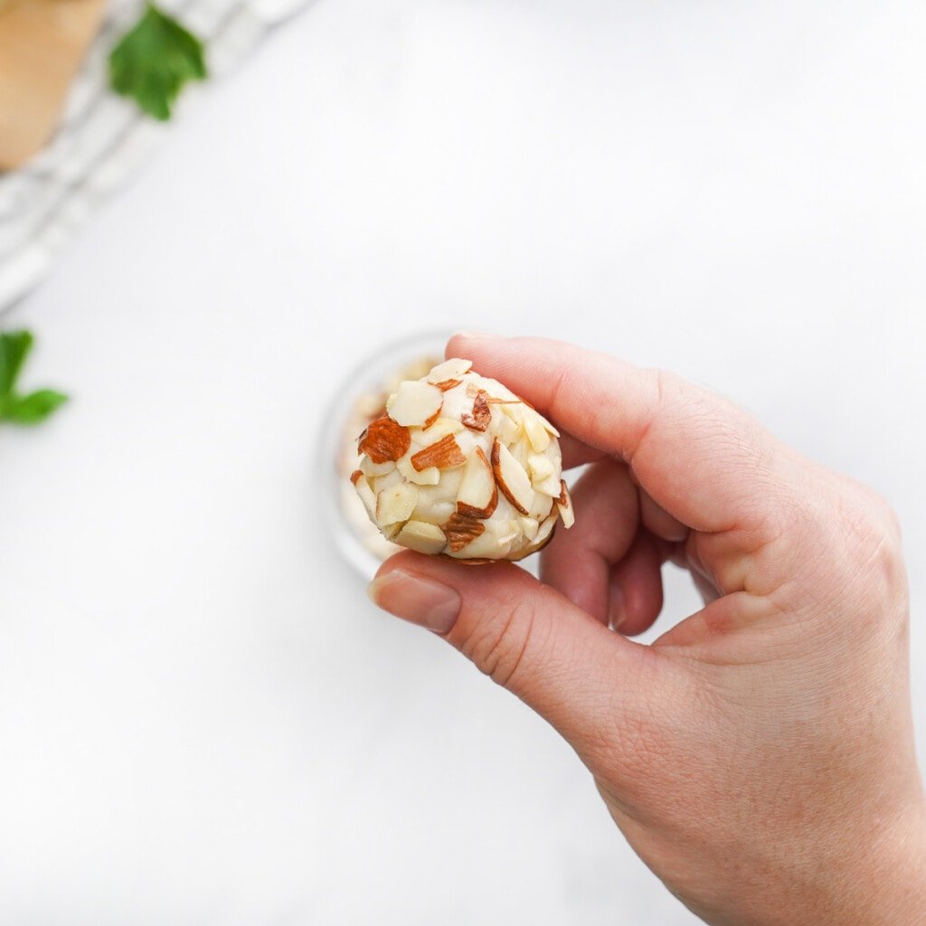 Monkey bread biscuit coated with almonds.