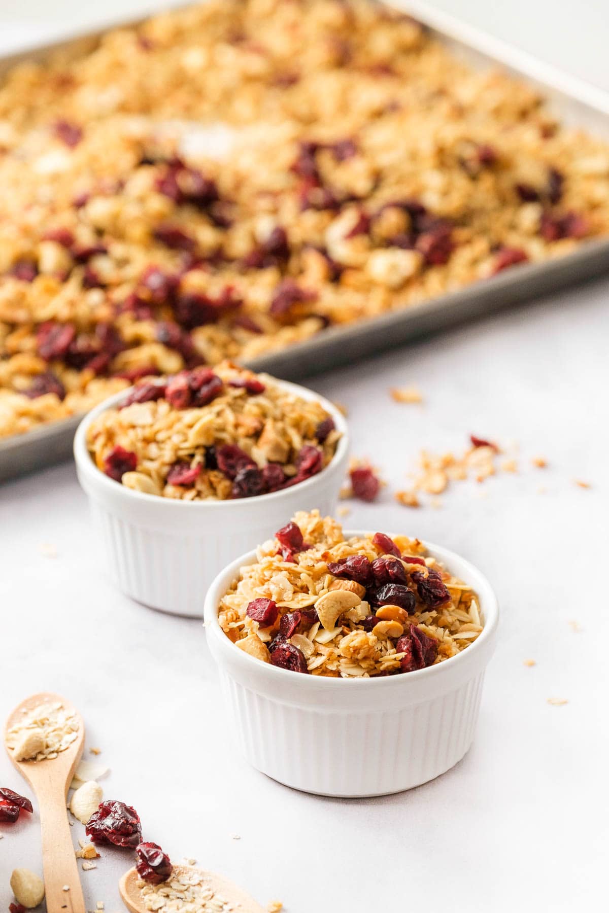 Homemade Granola in pan and in bowls.