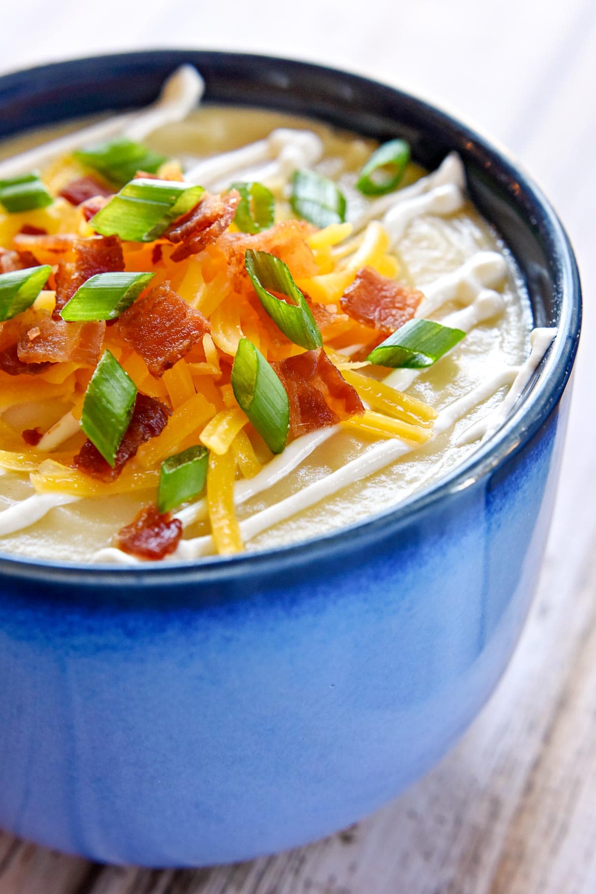 Baked Potato Soup close-up in bowl.