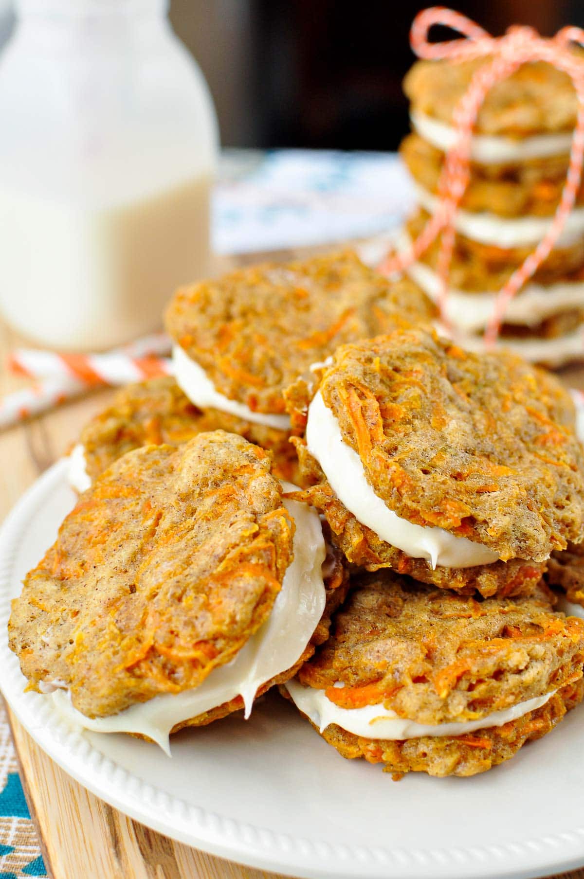 Carrot Cake Cookies piled on a plate.