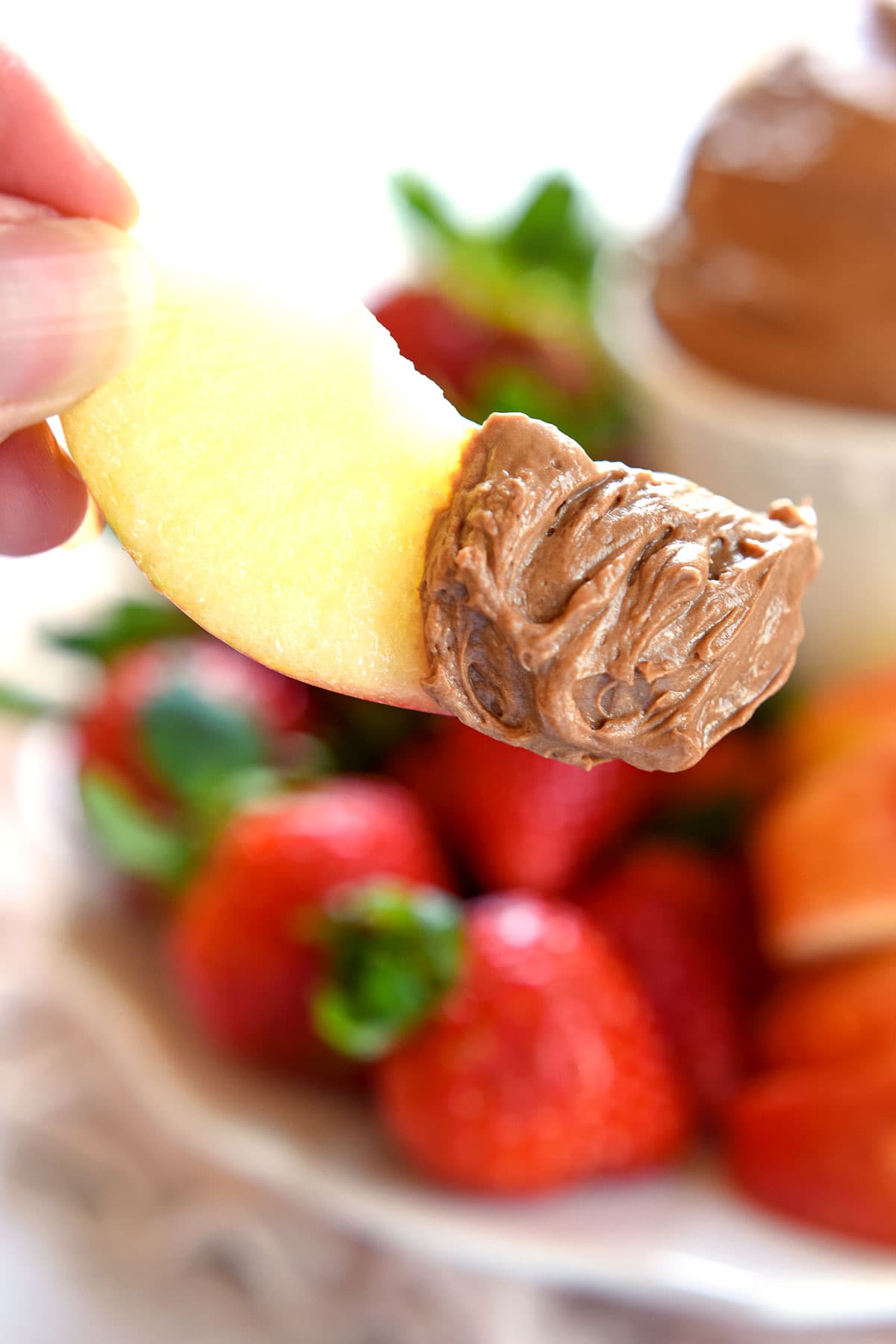 Chocolate Fruit Dip on apple slice.