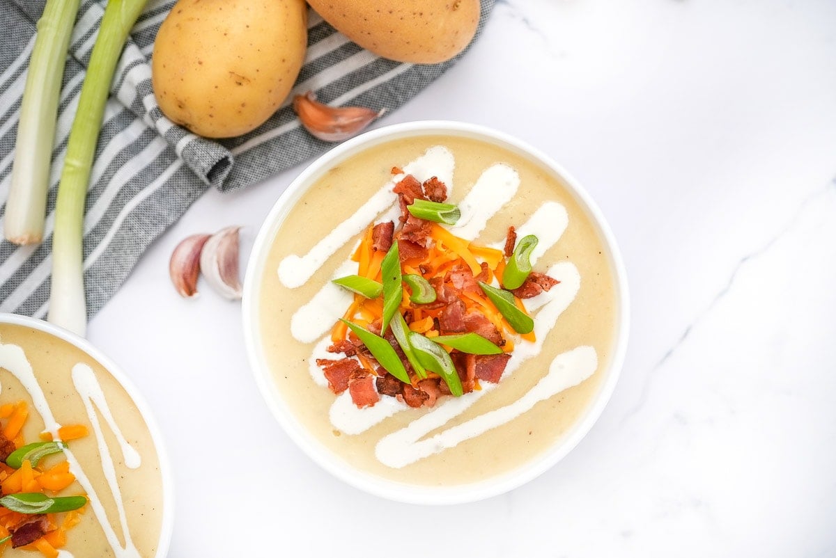 Aerial view of Loaded Baked Potato Soup in bowl.