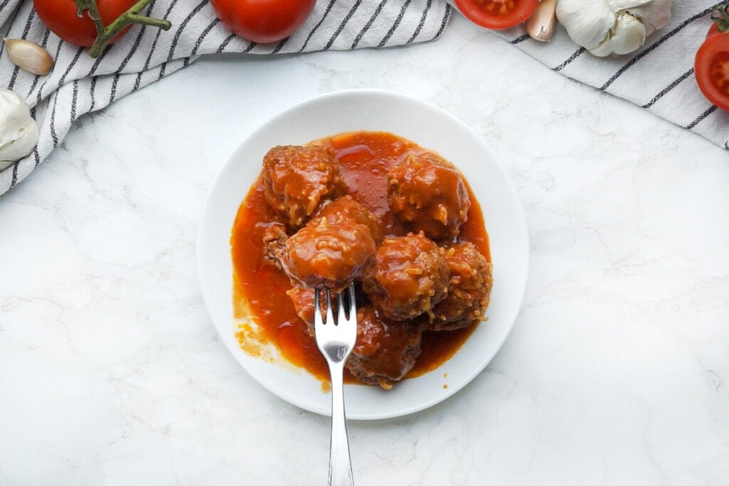 Aerial view of Porcupine Meatballs recipe with fork.