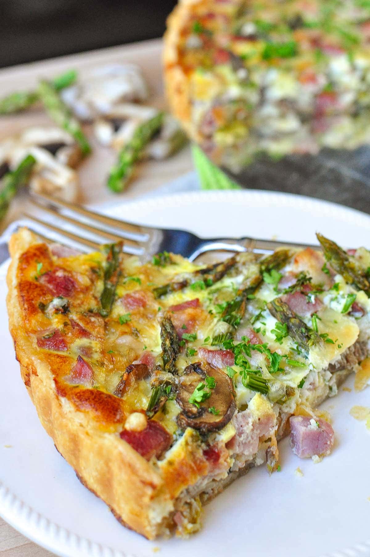 Close-up of Asparagus Tart slice on plate.