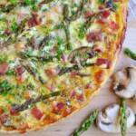 Asparagus Tart with mushrooms, ham, and Swiss cheese.