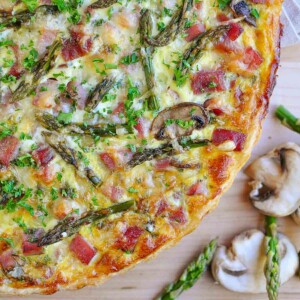 Asparagus Tart with mushrooms, ham, and Swiss cheese.