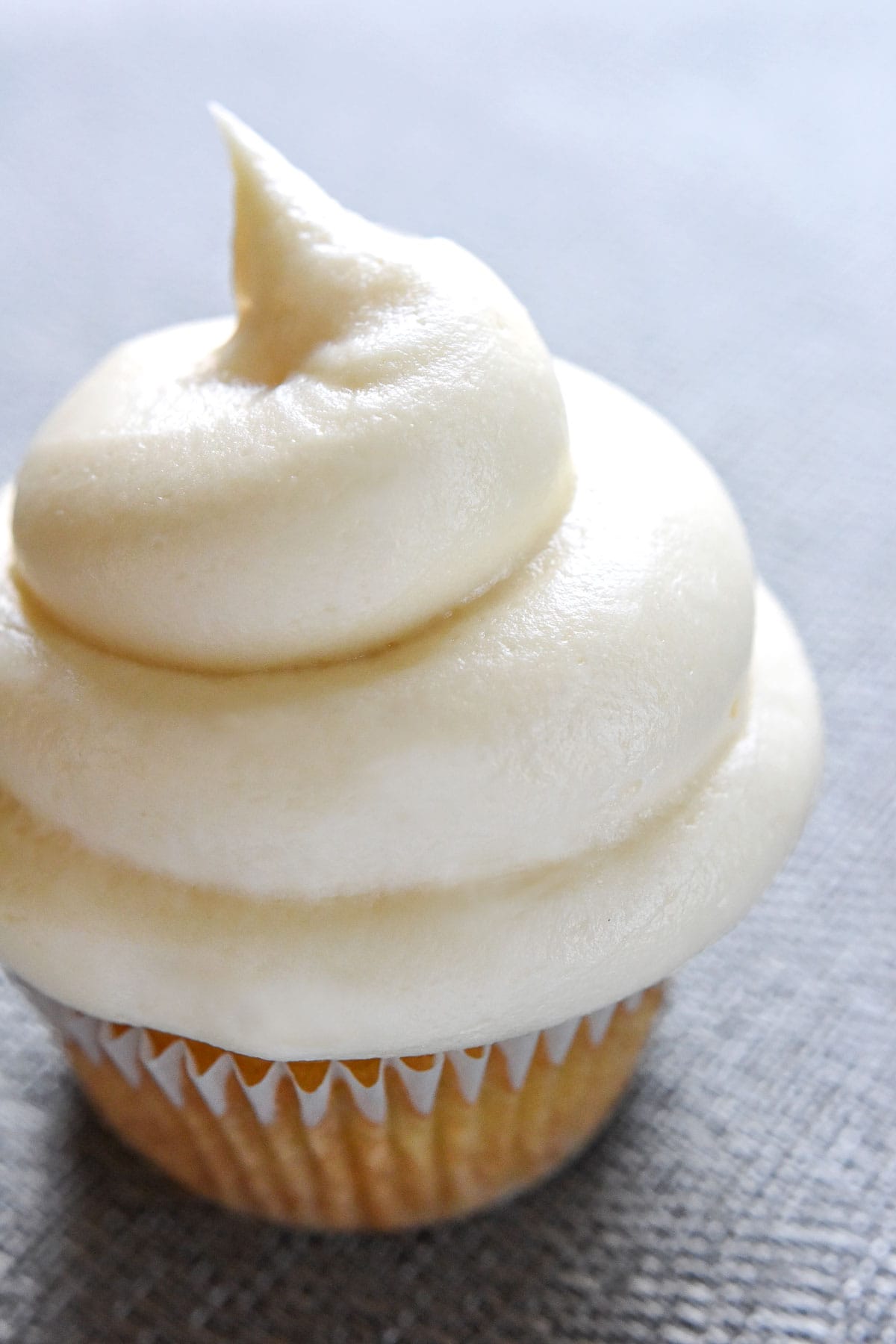 Cream Cheese Frosting recipe on cupcake.