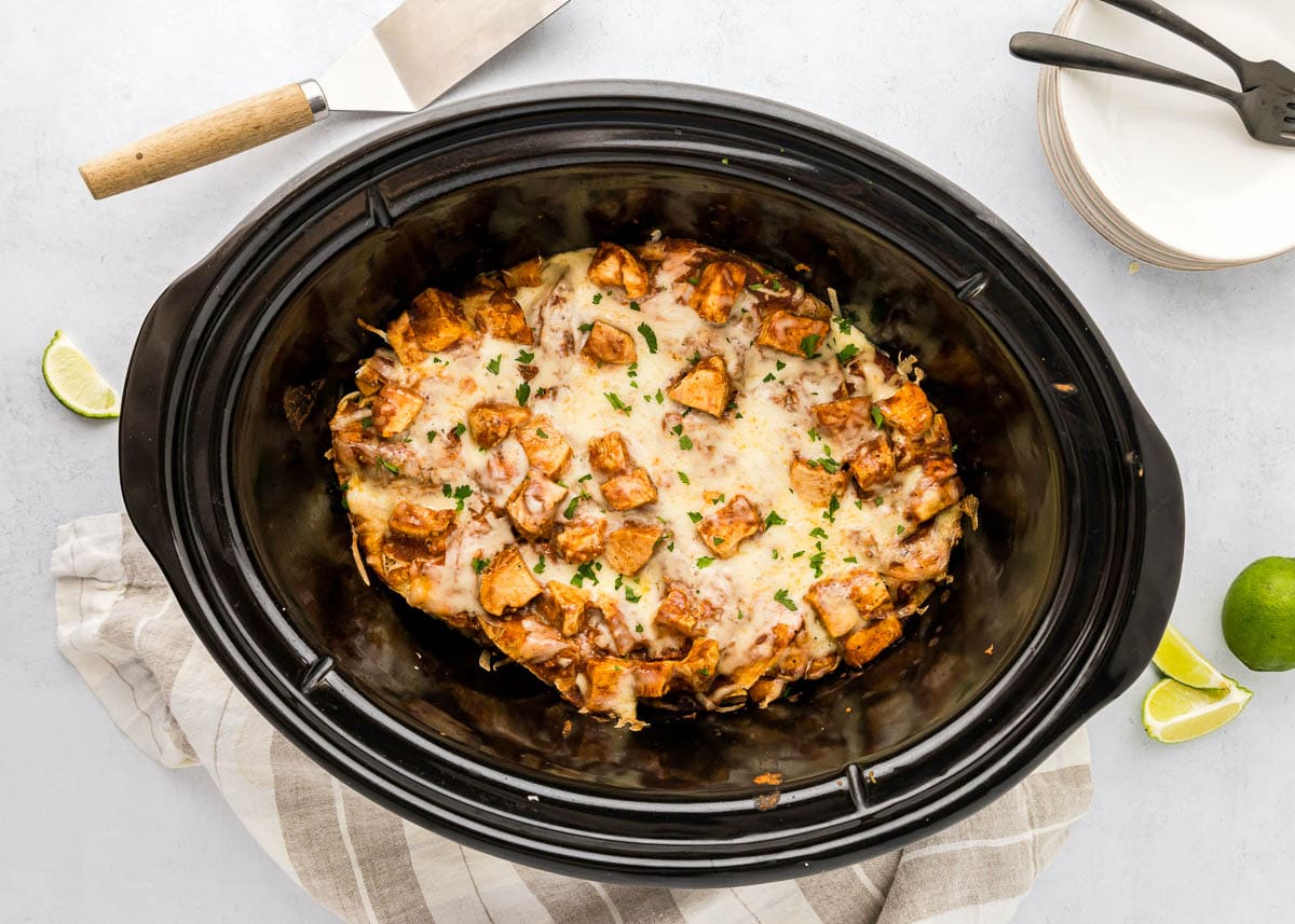 Crock Pot Chicken Enchiladas in slow cooker.