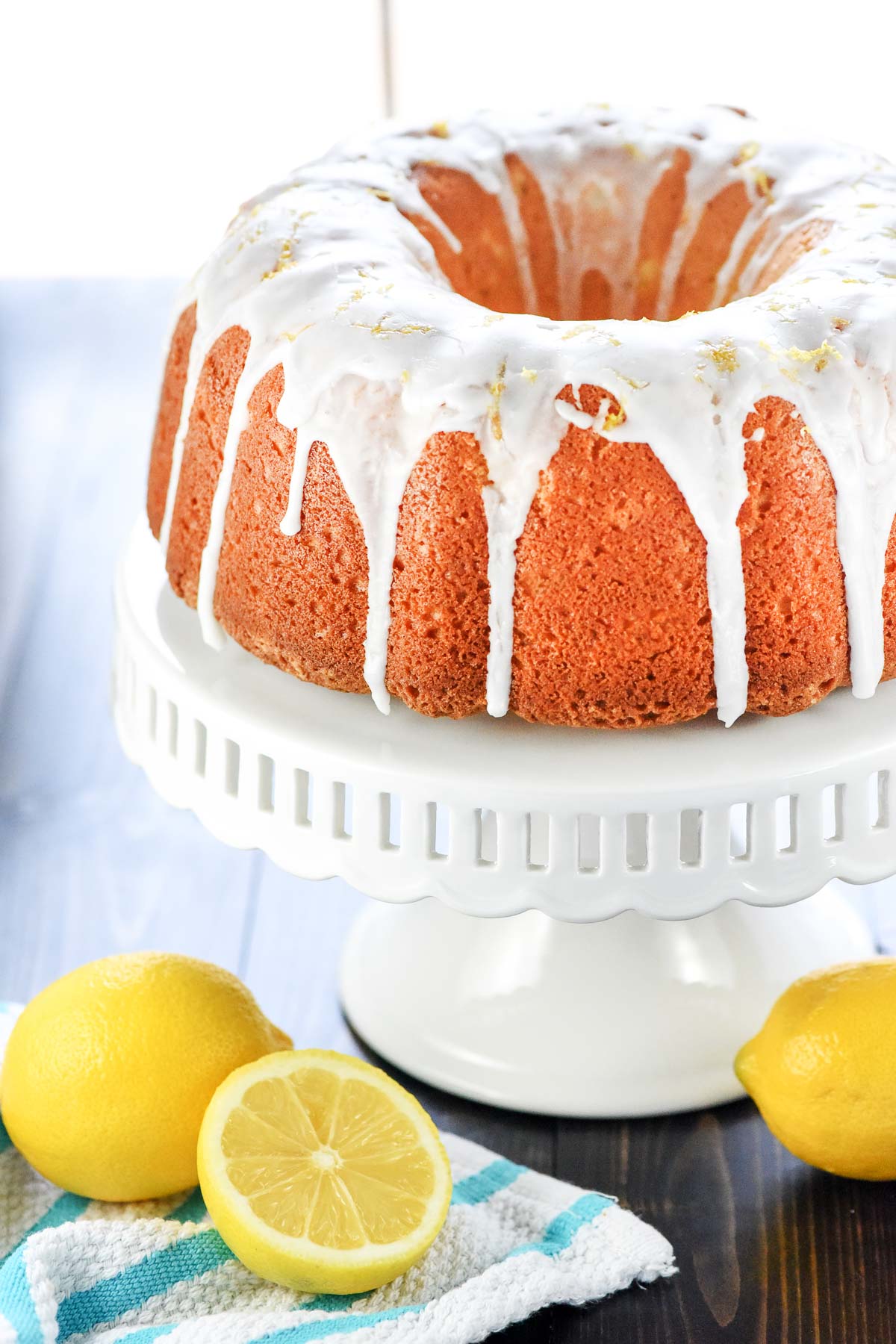 Lemon Pound Cake recipe on cake stand.