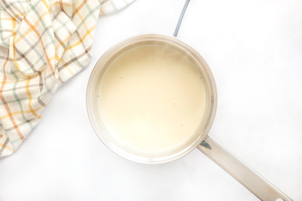 Homemade Vanilla Coffee Creamer heated in pot.