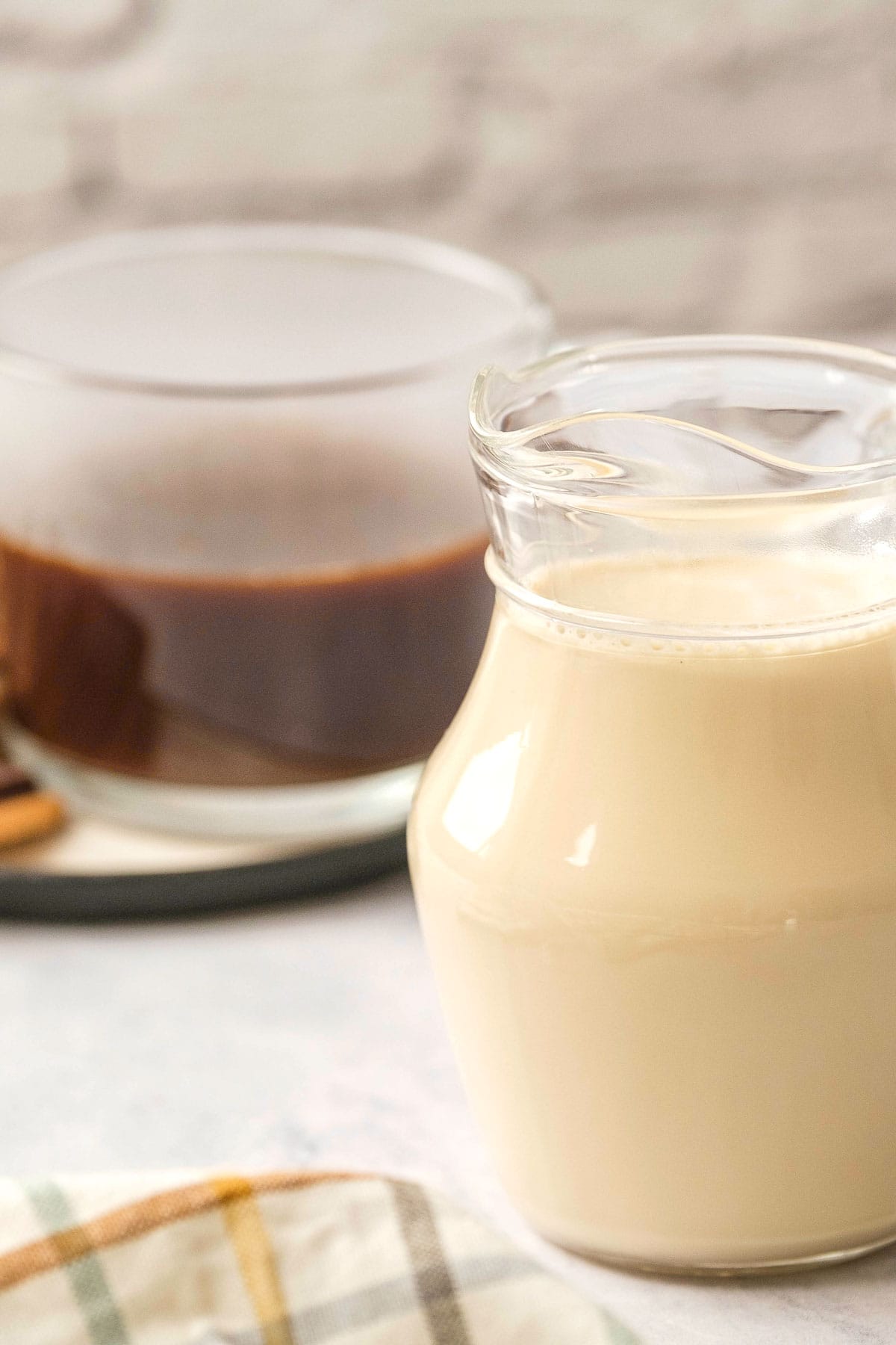 Homemade Vanilla Coffee Creamer with black coffee.