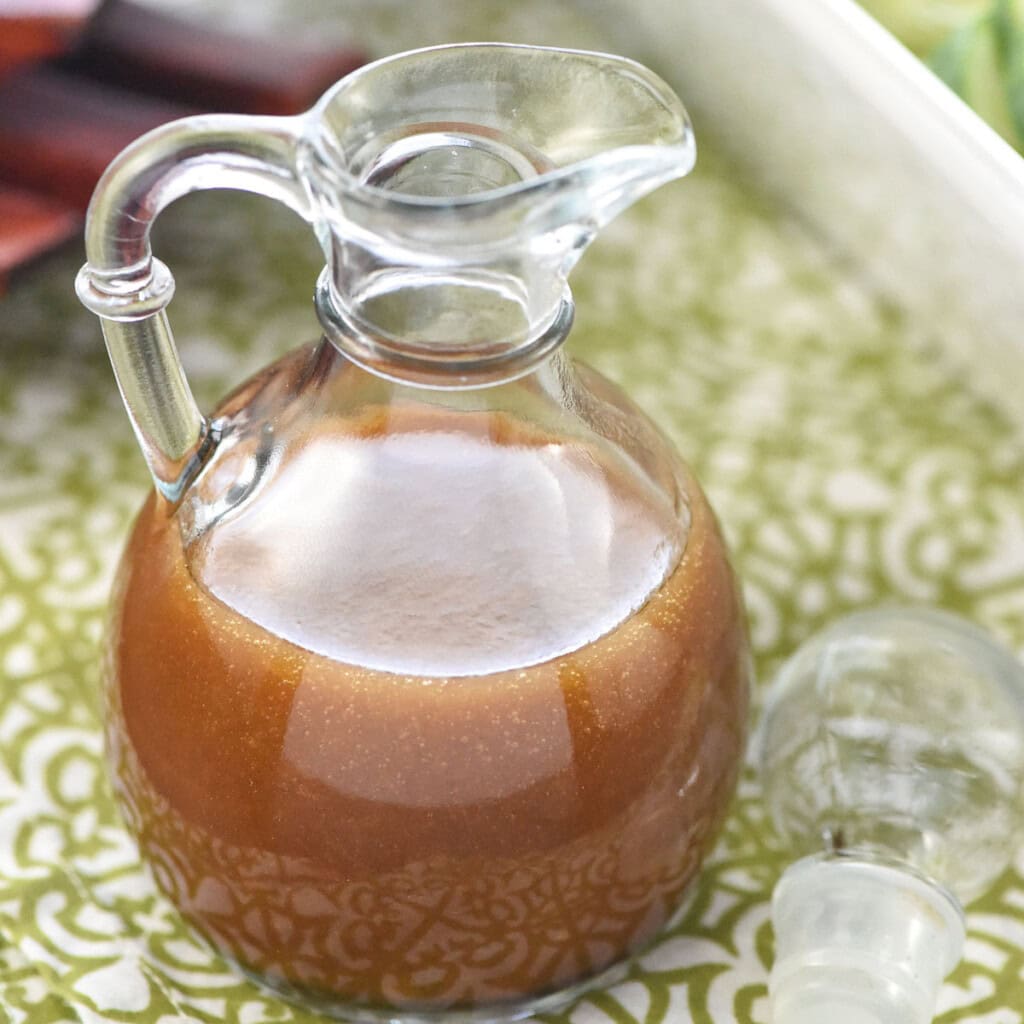 Asian Salad Dressing in glass bottle.