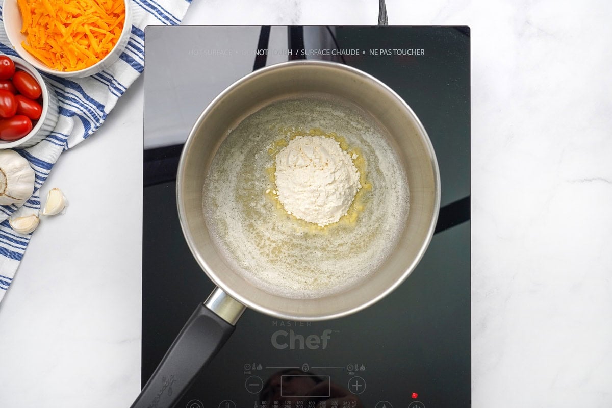 Making a roux for first step of cheese sauce to go in homemade cheeseburger macaroni.