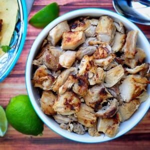 Slow Cooker Carnitas piled in bowl.