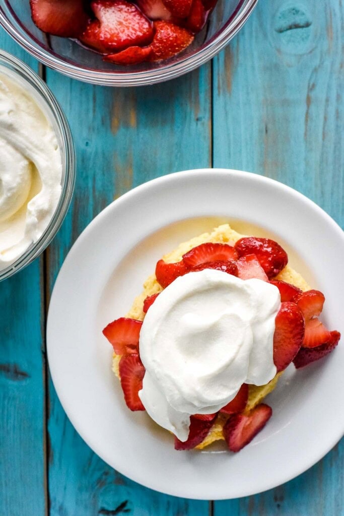 Assembling a recipe for strawberry shortcake.