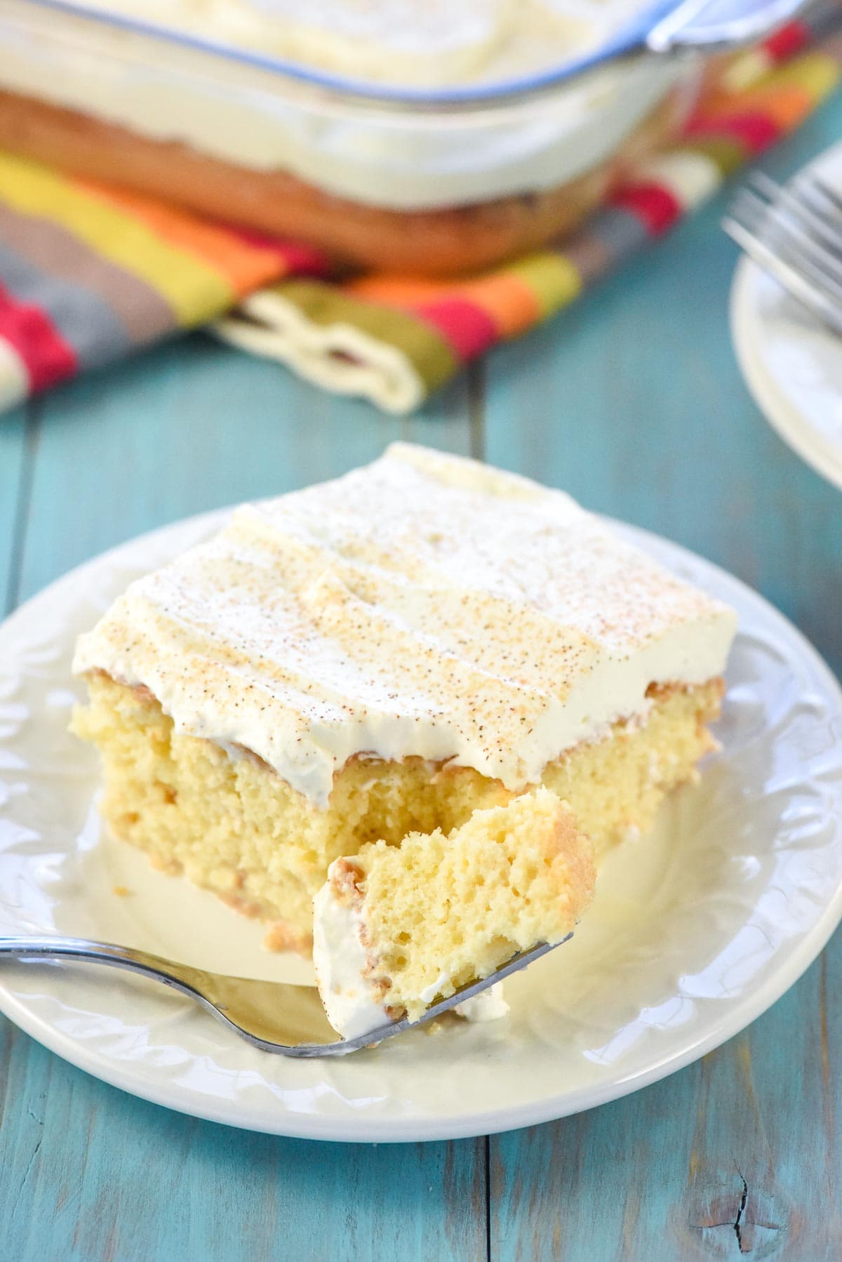 Tres Leche Cake with bite on fork.