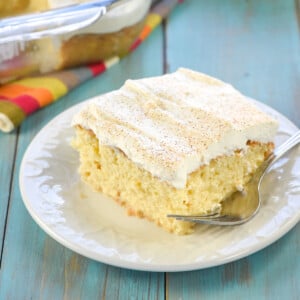 Easy Tres Leches Cake on plate with fork.