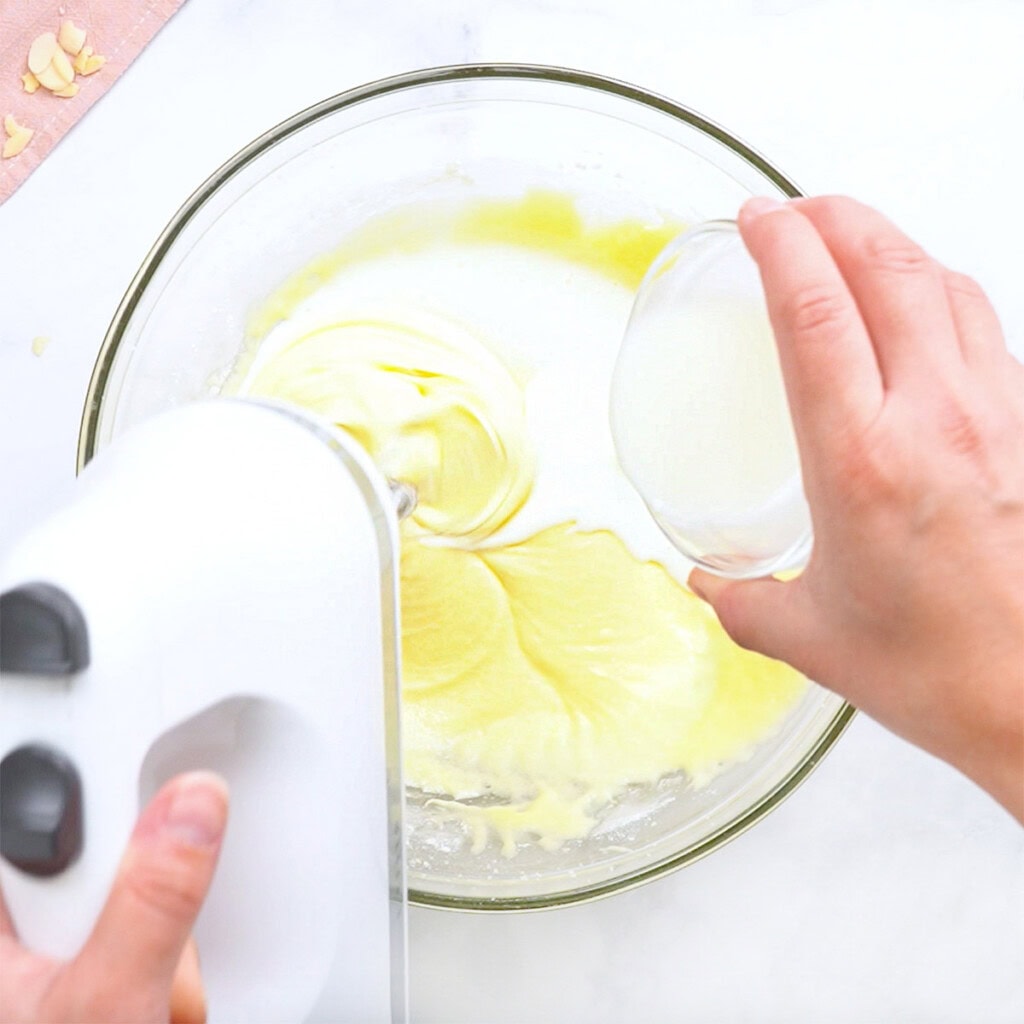 Adding buttermilk to batter.